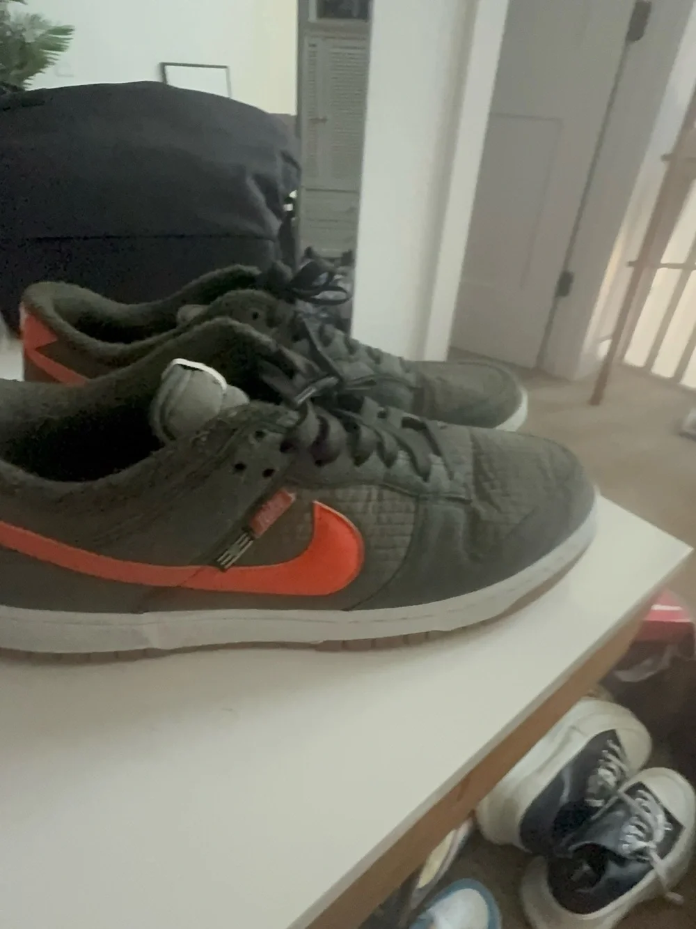 Nike Men’s Olive Green Sneakers with Orange Swoosh